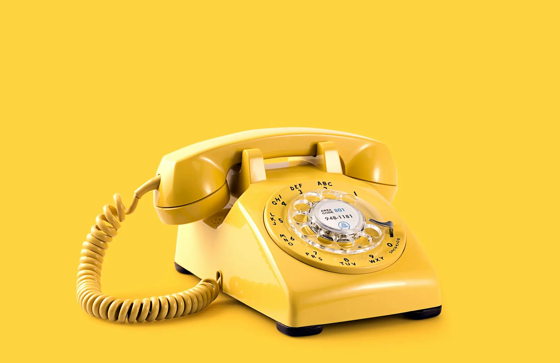 yellow rotary telephone